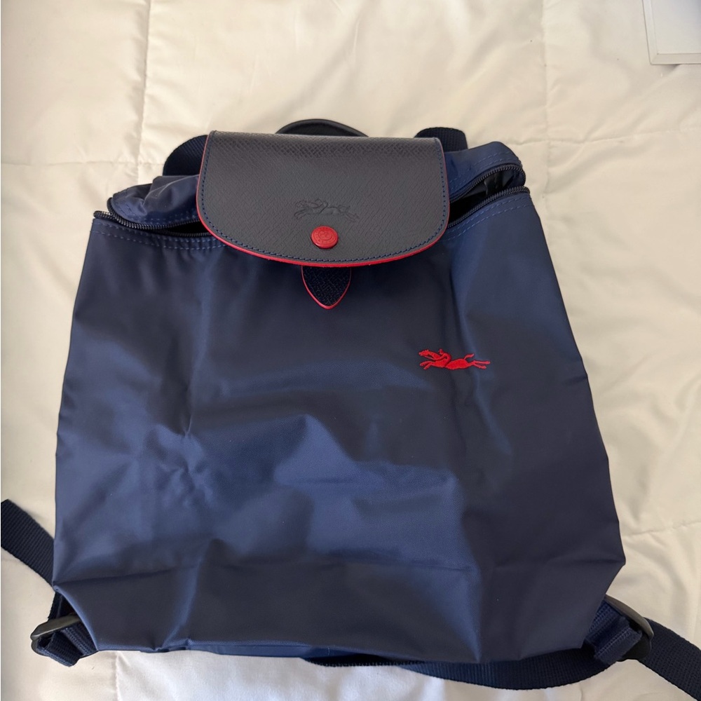 Navy Blue LONGCHAMP Backpack with Red Accents